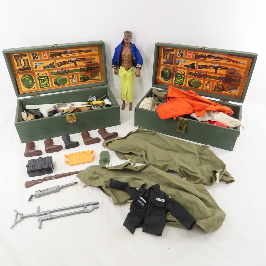 2 GI JOE Wood Footlockers, Access.& 1992 Figure: 2 GI JOE Wood Footlockers, Access.& 1992 Figure - 1992 Stalker Ranger African American Figure, 2 cases with clothing and accessories. LOT SIZE: 14x10x8", 6.5 lbsPhotos are part of description, please