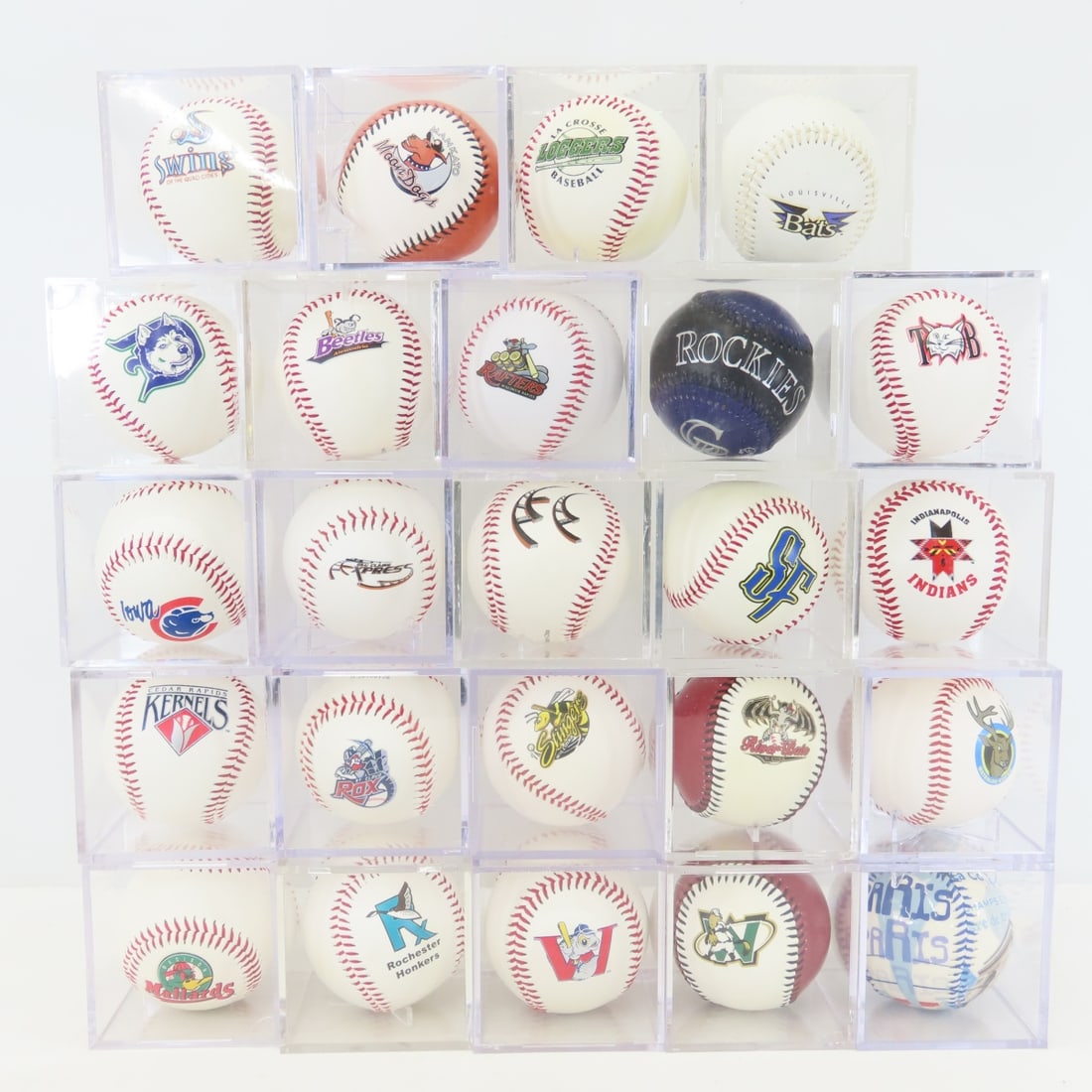 23 Non Major League Baseball Team Fotoballs: 23 Non Major League Baseball Team Fotoballs - and 1 Paris, France souvenir ball, in acrylic cases. LOT SIZE: 14x10x7", 14 lbsPhotos are part of description, please ask questions and read terms &