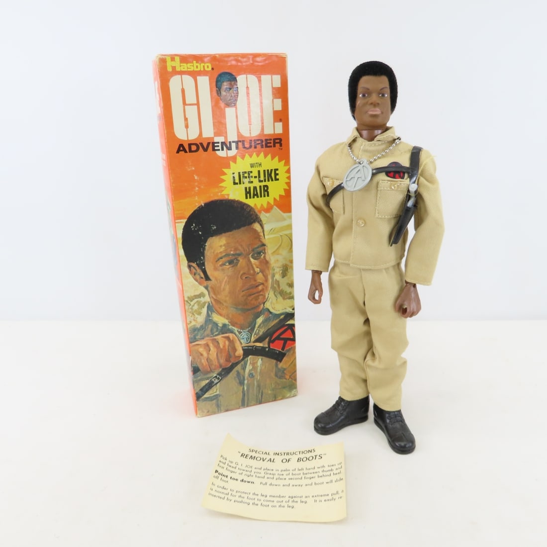 Vintage GI Joe African American Adventurer & box: Vintage GI Joe African American Adventurer & box - Lot Size 12x4x3" 1 LBPhotos are part of description, please ask questions and read terms & conditions before bidding. 