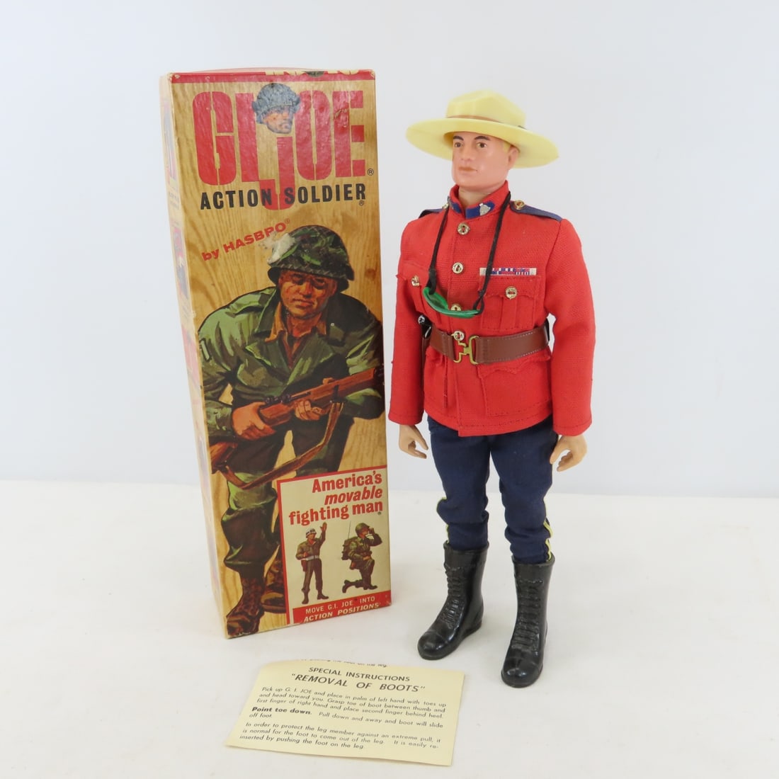 Vintage GI Joe Mountie in Vintage Soldier box: Vintage GI Joe Mountie in Vintage Soldier box - Lot Size 12x4x3" 1 LBPhotos are part of description, please ask questions and read terms & conditions before bidding. 