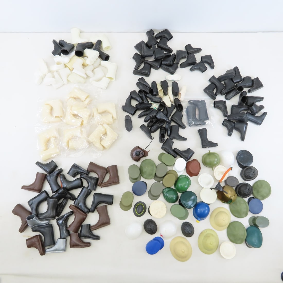 Collection of GI Joe & Similar Boots & Hats: Collection of GI Joe & Similar Boots & Hats - Lot Size 8x8x8" 6 LBPhotos are part of description, please ask questions and read terms & conditions before bidding. 