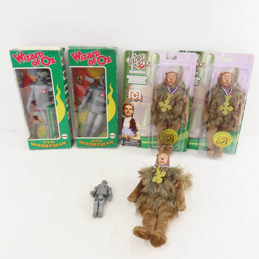 Mego Wizard of Oz figures on cards/in boxes: Mego Wizard of Oz figures on cards/in boxes - Loose Cowardly Lion & small Tin Man. Lot Size 10x10x6" 2 LBPhotos are part of description, please ask questions and read terms & conditions before