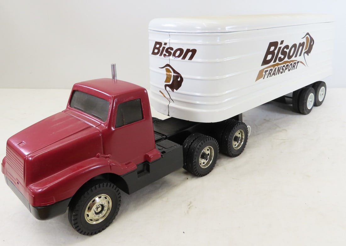 ERTL Truck & Custom Bison Trailer Restored: ERTL Truck & Custom Bison Trailer Restored - restored pressed steel truck, pressed steel trailer custom restored with decals, LOT SIZE:28x10x6", 11 LBS All information and photos are intended to be