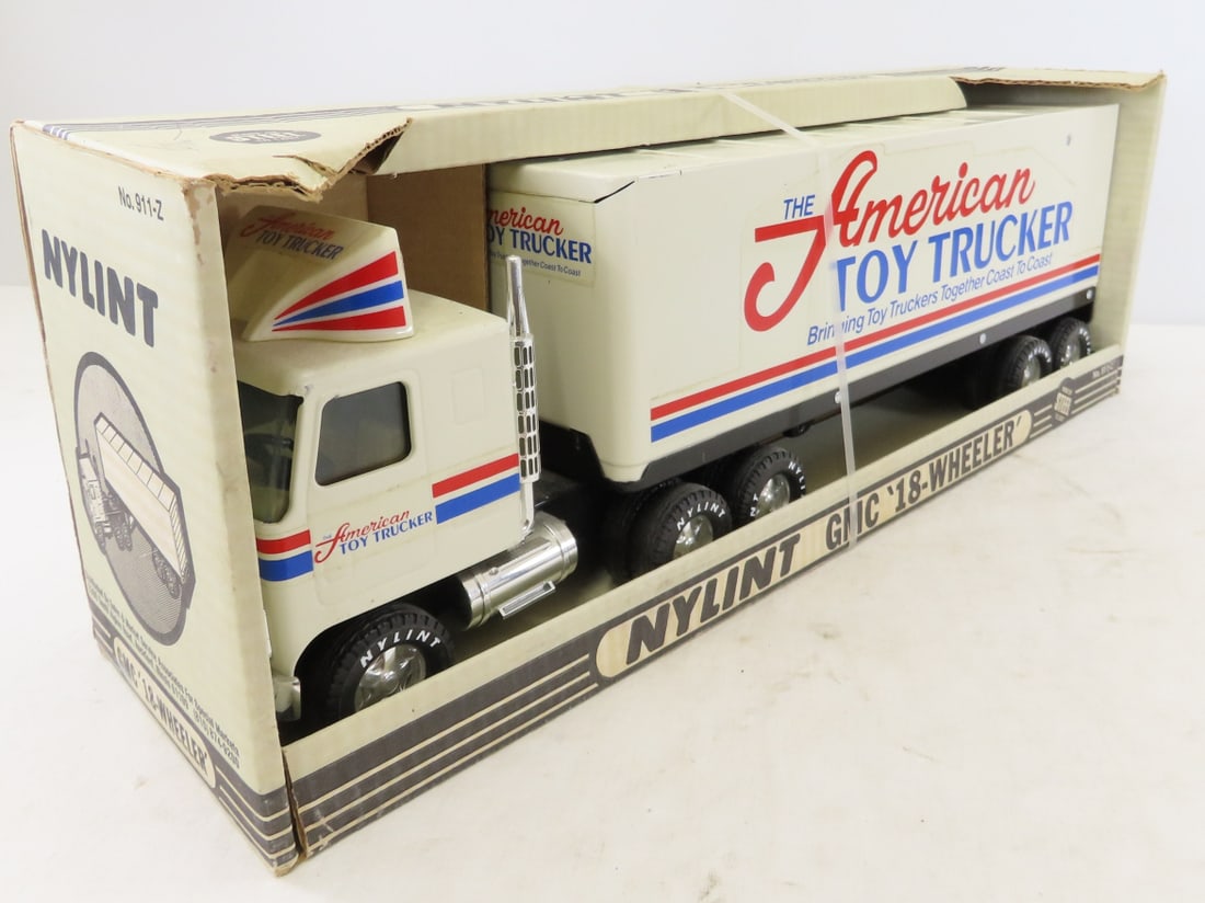 Vintage American Toy Trucker GMC Semi in Box: Vintage American Toy Trucker GMC Semi in Box - pressed steel, No 911-Z, LOT SIZE: 22x8x6", 5 LBS All information and photos are intended to be as accurate as possible, but errors are possible. No