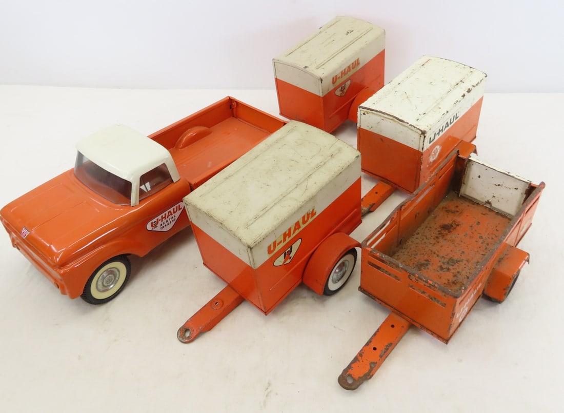 Restored Nylint U-Haul Truck & 4 Original Trailers: Restored Nylint U-Haul Truck & 4 Original Trailers - all pressed steel, LOT SIZE: 18x16x7", 8 LBS All information and photos are intended to be as accurate as possible, but errors are possible. No