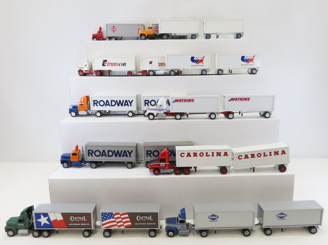 10 Winross Diecast Double Tractor Trailers: 10 Winross Diecast Double Tractor Trailers - 1:64, Yellow, Watkins, Carolina, Overnite and others, LOT SIZE: 15x10x7", 15 LBS All information and photos are intended to be as accurate as possible,