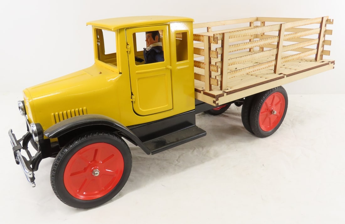 Old Time Toys Repro Buddy L Steel Stake Truck: Old Time Toys Repro Buddy L Steel Stake Truck - Wood bed & stakes. LOT SIZE 30x12x10" 12 LB All information and photos are intended to be as accurate as possible, but errors are possible. No item may