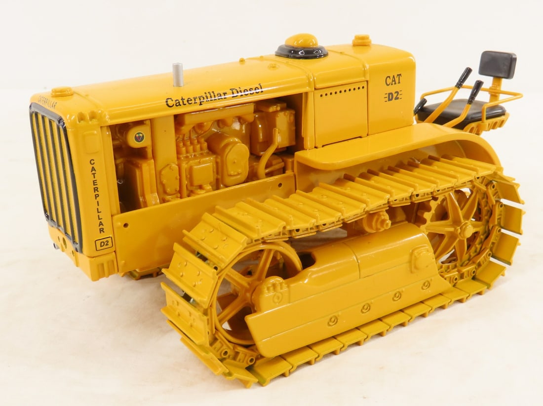SpecCast Caterpillar Diesel CAT D2 Orchard Crawler: SpecCast Caterpillar Diesel CAT D2 Orchard Crawler - ACMOC 2004, 1:25 Scale . LOT SIZE 9x5x4" 2 LB All information and photos are intended to be as accurate as possible, but errors are possible. No