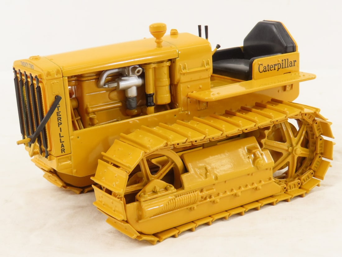 Norscot Caterpillar Twenty Two Crawler Tractor: Norscot Caterpillar Twenty Two Crawler Tractor - LOT SIZE 7x5x5" 2 LB All information and photos are intended to be as accurate as possible, but errors are possible. No item may be returned or