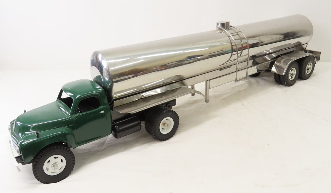 Custom Scratch Built Semi Truck & 27" Tanker: Custom Scratch Built Semi Truck & 27" Tanker - Etched in the cap on the top of the tanker is 55 316 1501. 1 wheel falls off, Lot Size 30x12x10" All information and photos are intended to be as