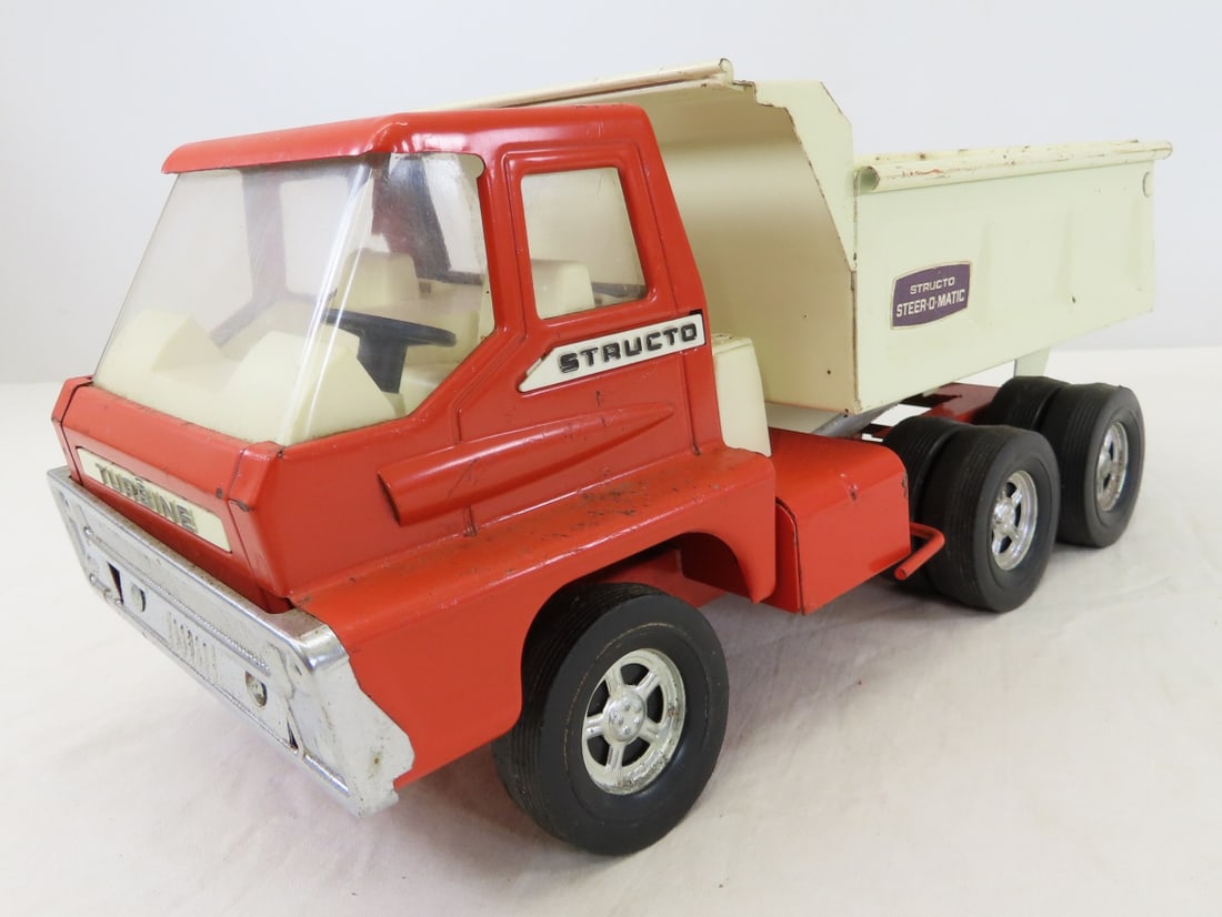 Original Structo Steer-o-matic Turbine Dump Truck: Original Structo Steer-o-matic Turbine Dump Truck - Hydraulics don't work, more of a launcher now. LOT SIZE 15x7x7" 3 LB All information and photos are intended to be as accurate as possible, but erro