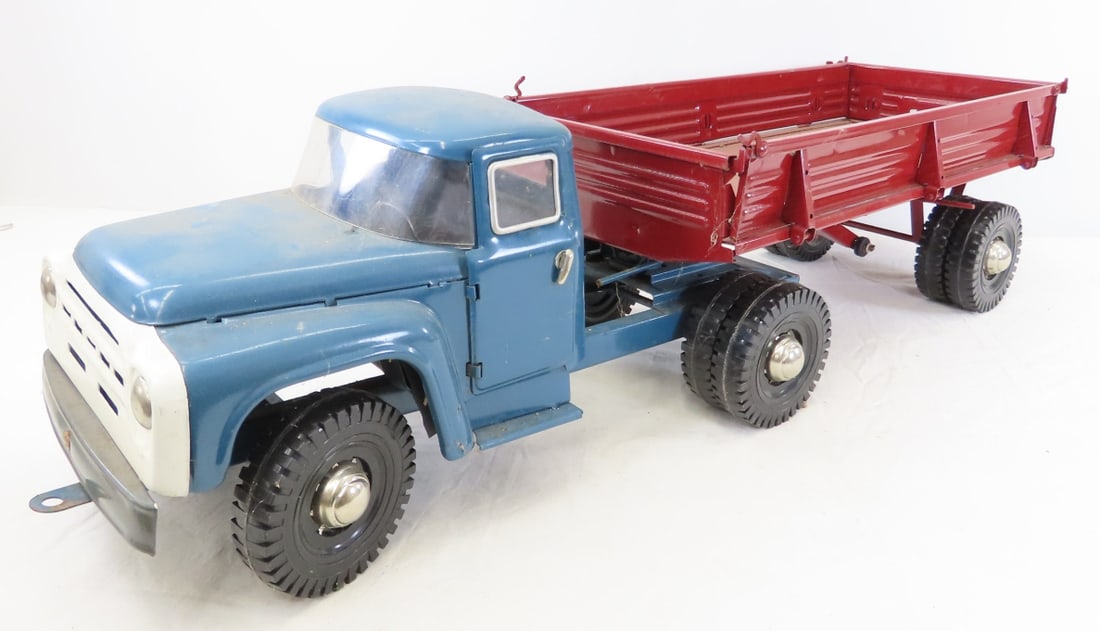 Vintage Soviet Era ZIL Truck & Trailer: Vintage Soviet Era ZIL Truck & Trailer - LOT SIZE 20x20x12" 12 LB All information and photos are intended to be as accurate as possible, but errors are possible. No item may be returned or refused