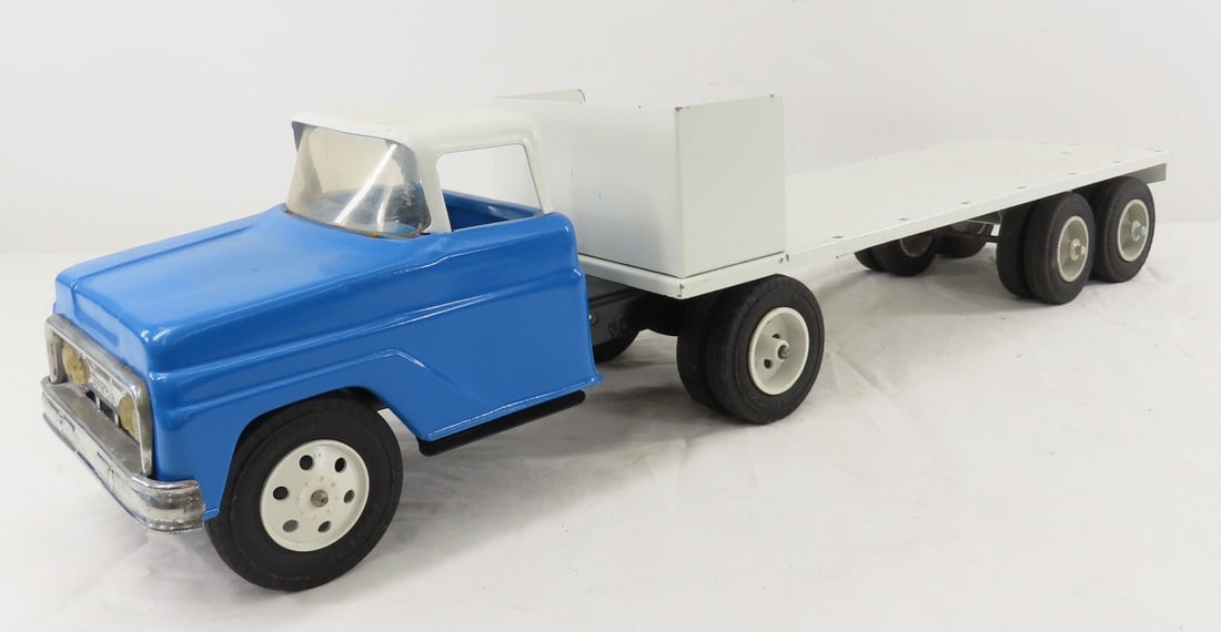 Restored Tonka Truck with Scratch Built Flat Bed: Restored Tonka Truck with Scratch Built Flat Bed - pressed steel, LOT SIZE: 16x6x9", 6 LBS All information and photos are intended to be as accurate as possible, but errors are possible. No item may