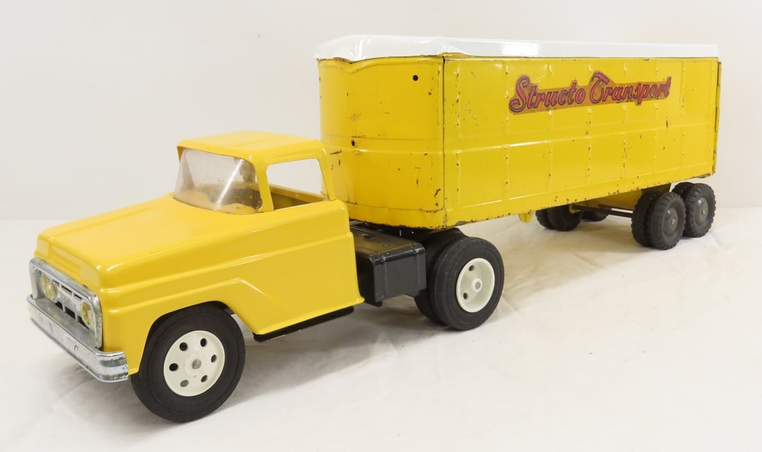 Repainted Tonka Truck & Original Structo Trailer: Repainted Tonka Truck & Original Structo Trailer - LOT SIZE: 16x12x6", 7 LBS All information and photos are intended to be as accurate as possible, but errors are possible. No item may be returned or 