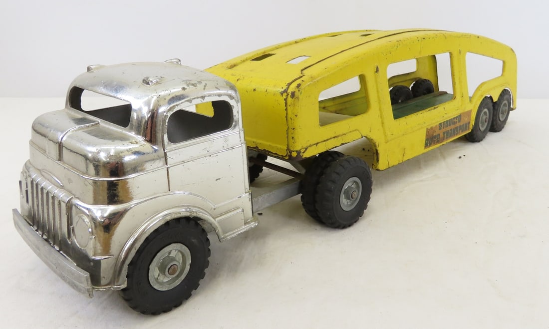 Original Structo Pressed Steel Auto Transport: Original Structo Pressed Steel Auto Transport - LOT SIZE: 18x11x6", 5 LBS All information and photos are intended to be as accurate as possible, but errors are possible. No item may be returned or ref