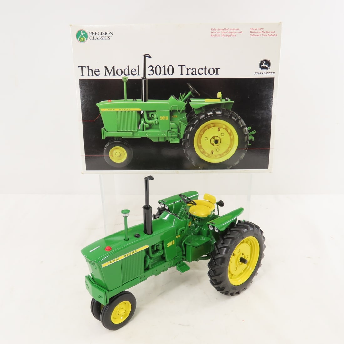 ERTL Precision Classics J Deere 3010 Tractor: ERTL Precision Classics J Deere 3010 Tractor - 1/16 diecast, with box, stock #15210, no booklet or coin,stock # 15210, LOT SIZE: 11x8x8", 4 LBS All information and photos are intended to be as ac