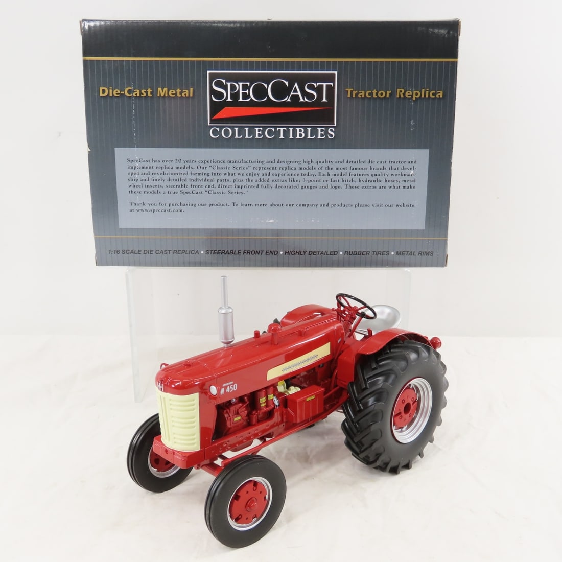 SpecCast IH International W450 Diesel WF Tractor: SpecCast IH International W450 Diesel WF Tractor - Wheatland front with Electrall, with box, 1/16 diecast, LOT SIZE: 11x8x8" 3.5 LBSAll information and photos, which are part of the description) are