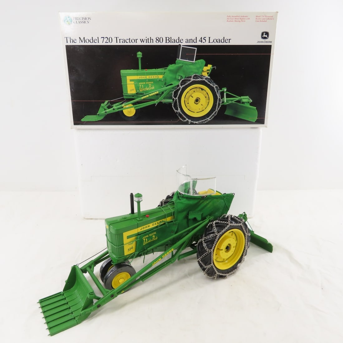 ERTL Precision JD 720 with 80 Blade & 45 Loader: ERTL Precision JD 720 with 80 Blade & 45 Loader - heat house, chains, 1/16 diecast, Precision Classics with box and medallion, No 15165, LOT SIZE" 15x8x8" 6 LBSAll information and photos, which are pa