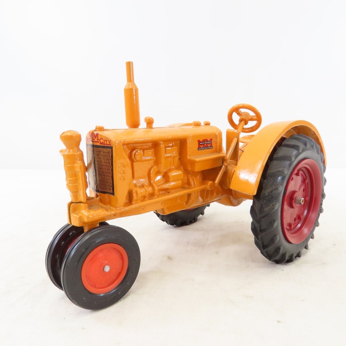 JLE Scale Models Minneapolis-Moline U NF Tractor: JLE Scale Models Minneapolis-Moline U NF Tractor - 1/16 diecast, LOT SIZE: 8x5x6" 2.5 LBSAll information and photos, which are part of the description) are intended to be as accurate as possible, but 
