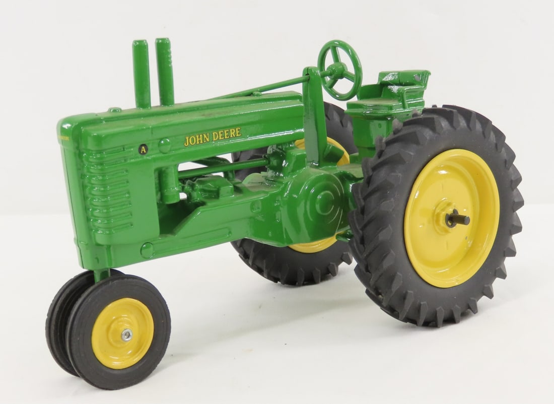 Peter Freiheit John Deere Model A Tractor: Peter Freiheit John Deere Model A Tractor - narrow front. 1/16 diecast, marked 18 PF on bottom, LOT SIZE:8x5x6" 3 LBSAll information and photos, which are part of the description) are intended to be a