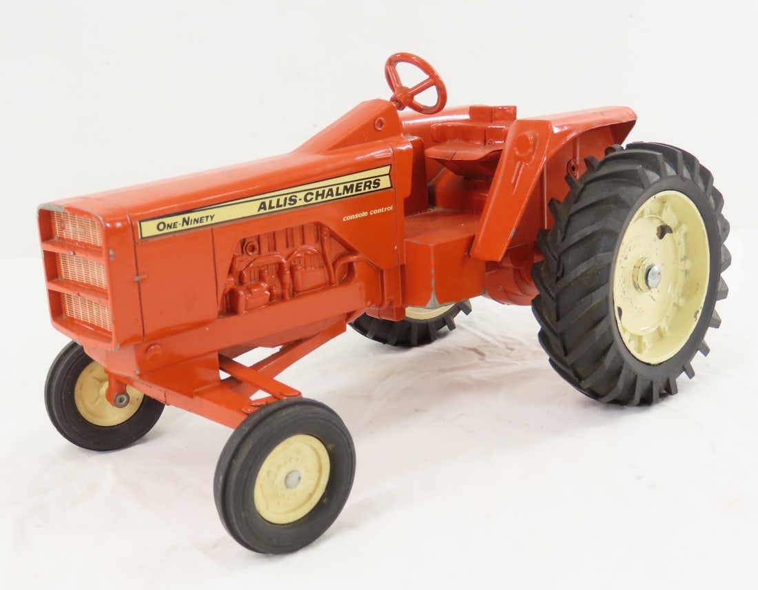 ERTL Allis-Chalmers One-Ninety Row Crop Tractor: ERTL Allis-Chalmers One-Ninety Row Crop Tractor - console control, rear duals, 1/16 diecast, LOT SIZE: 10x8x6" 3 LBSAll information and photos, which are part of the description) are intended to be