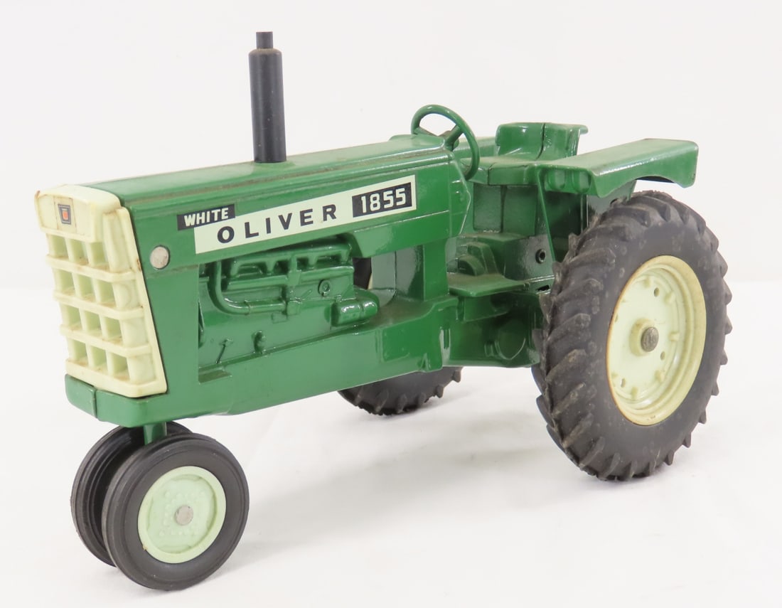 ERTL White Oliver 1855 NF Tractor: ERTL White Oliver 1855 NF Tractor - 1/16 diecast, LOT SIZE: 9x5x6" 1.5 LBSAll information and photos, which are part of the description) are intended to be as accurate as possible, but errors are poss