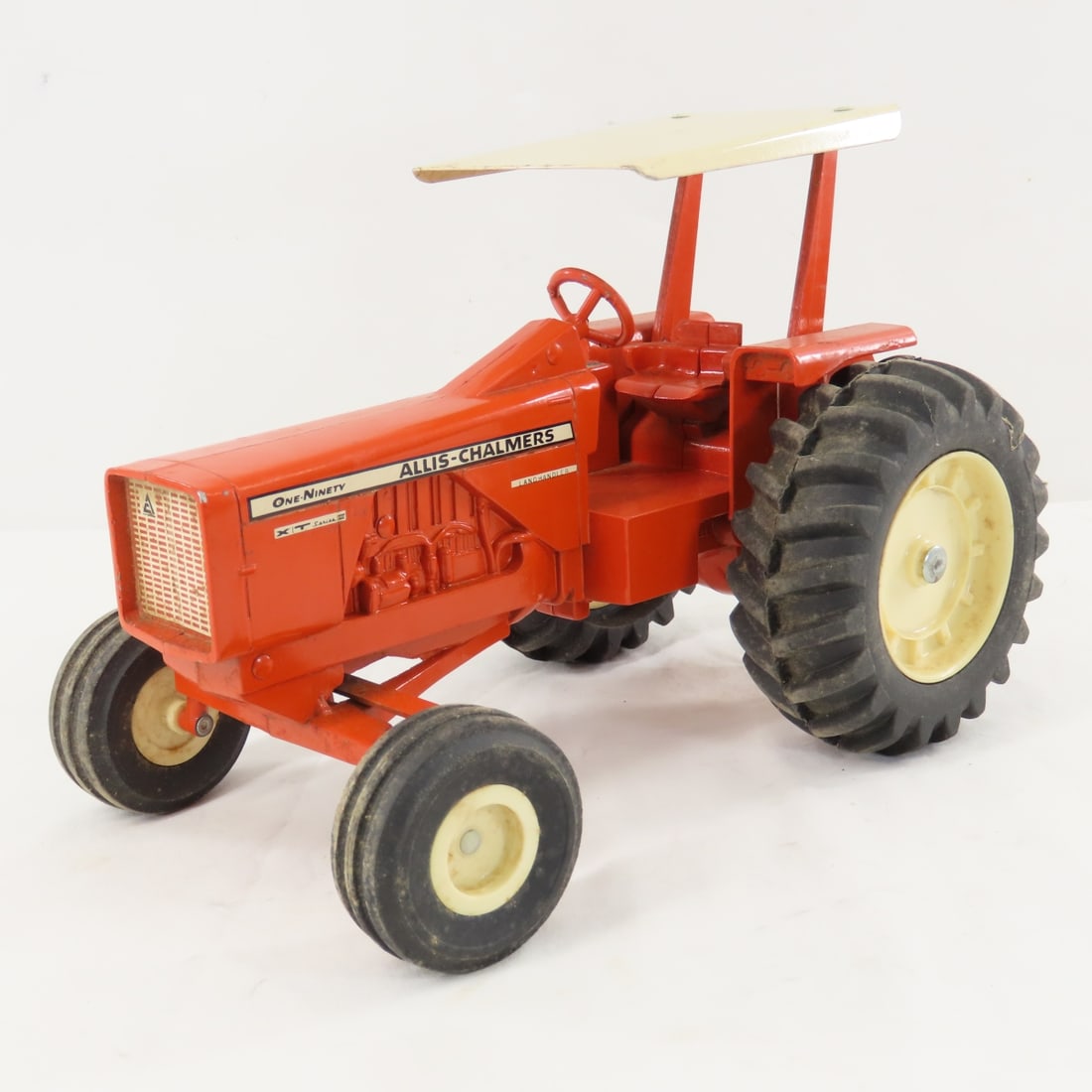 ERTL A-C One-Ninety XT Series III Landhandler: ERTL A-C One-Ninety XT Series III Landhandler - Allis-Chalmers with ROPS canopy, row crop, 1/16 diecast, LOT SIZE: 10x7x8" 3 LBSAll information and photos, which are part of the description) are inten