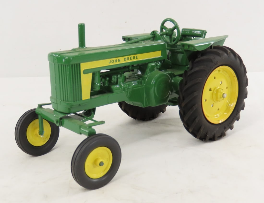 Custom John Deere WF Tractor w/ 3 pt Hitch: Custom John Deere WF Tractor w/ 3 pt Hitch - Firestone tires, 1/16 diecast, LOT SIZE: 9x5x6" 2 LBSAll information and photos, which are part of the description) are intended to be as accurate as possi