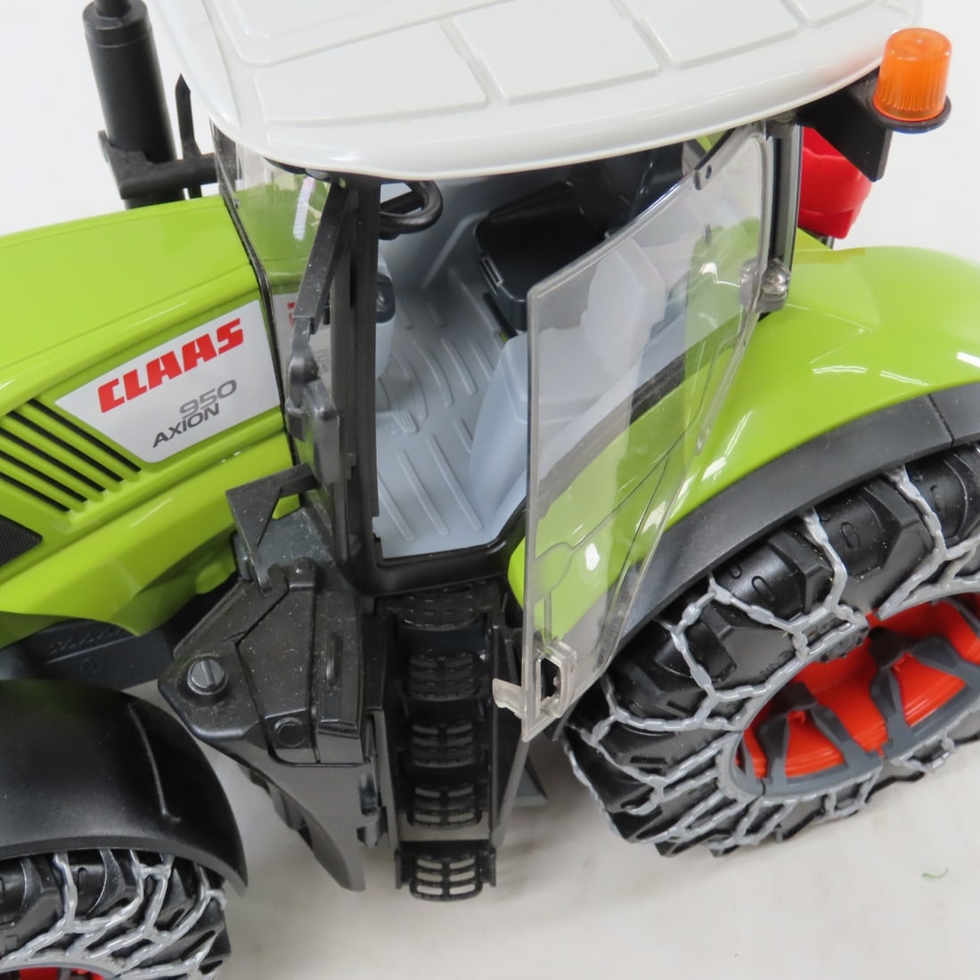 Bruder CLAAS 950 AXION Tractor with Snow Chains - 16