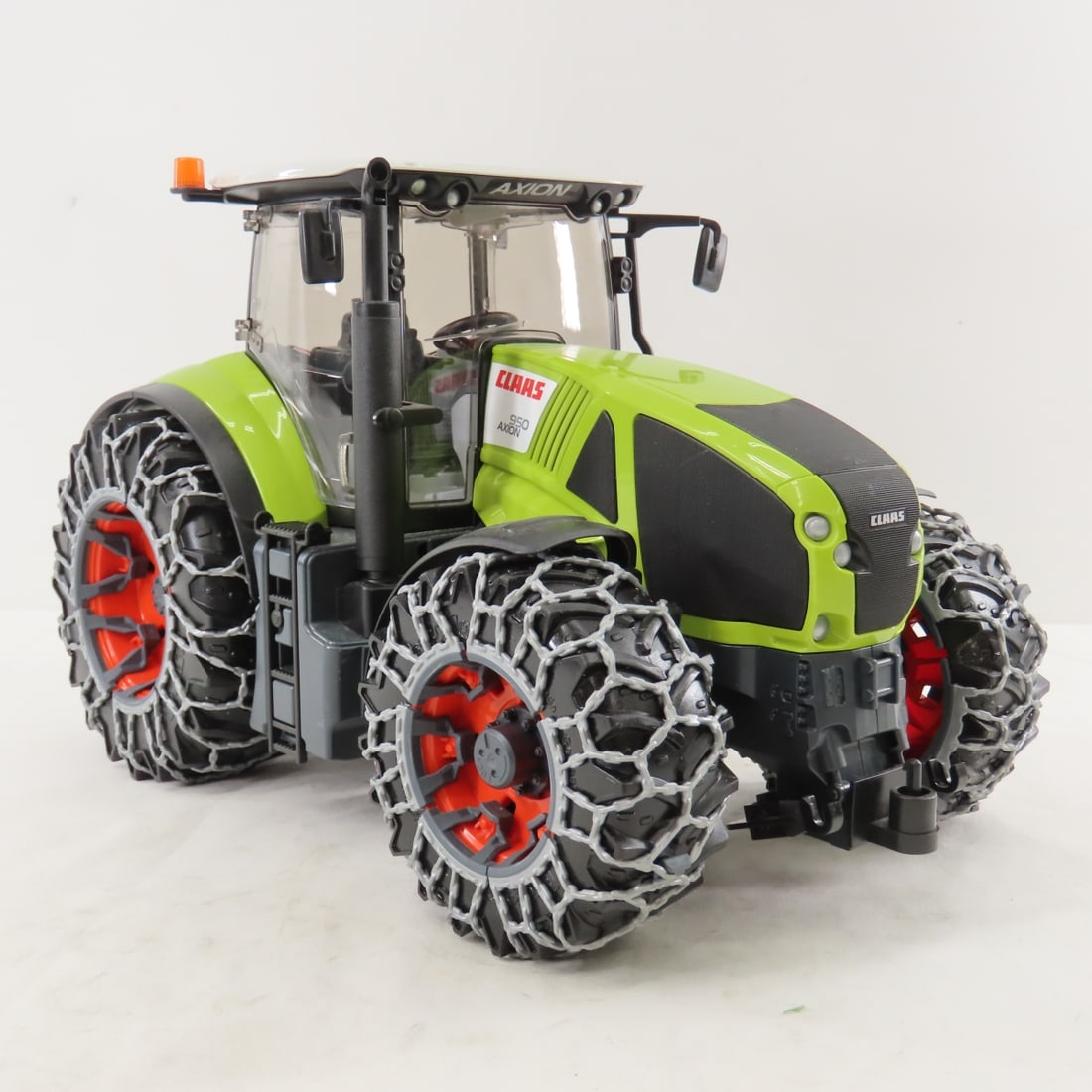 Bruder CLAAS 950 AXION Tractor with Snow Chains - 7