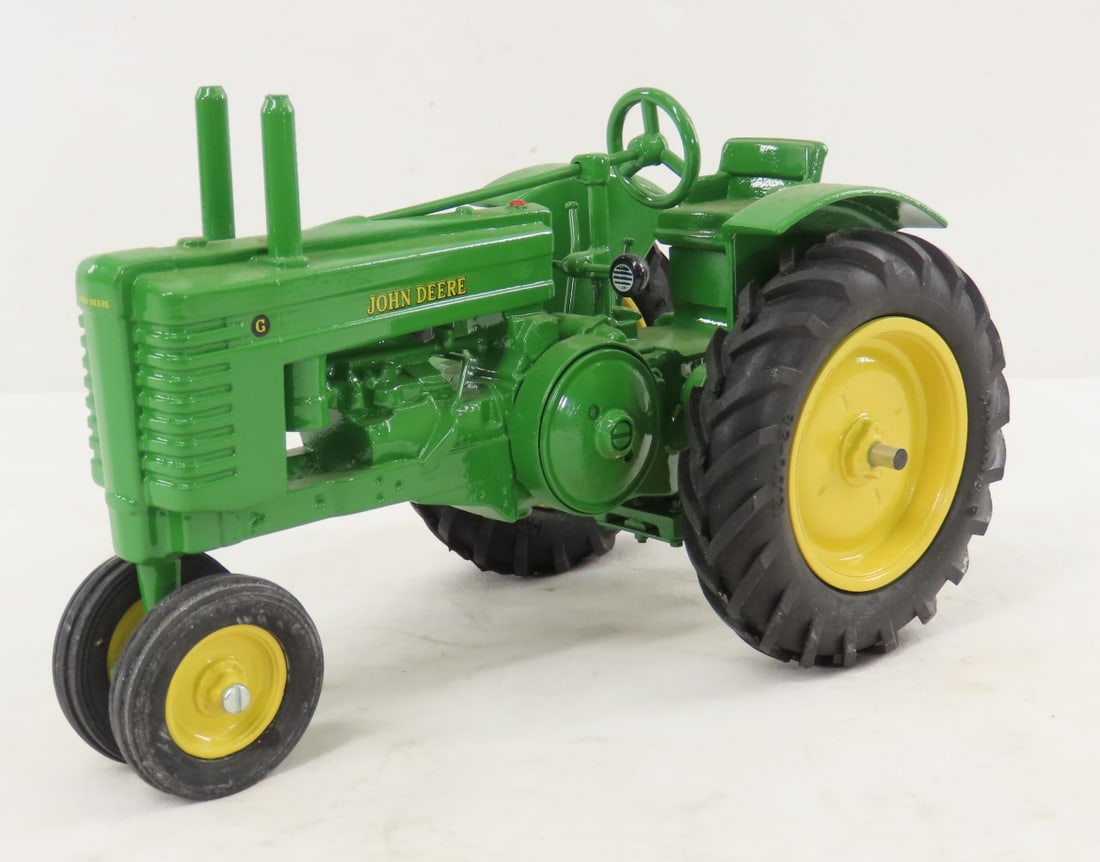 Peter Freiheit John Deere Model G NF Tractor: Peter Freiheit John Deere Model G NF Tractor - marked F 19, Firestone tires, 1/16 diecast, LOT SIZE: 9x6x6" 3.5 LBSAll information and photos, which are part of the description) are intended to be as 