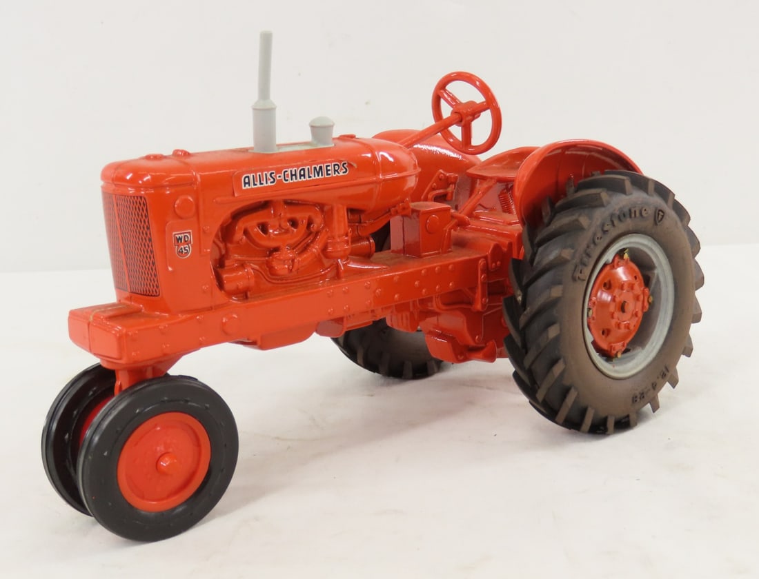 ERTL Allis-Chalmers WD-45 NF Row Crop Tractor: ERTL Allis-Chalmers WD-45 NF Row Crop Tractor - 1/16 diecast, Firestone tires, LOT SIZE: 8x5x6" 2 LBSAll information and photos, which are part of the description) are intended to be as accurate as