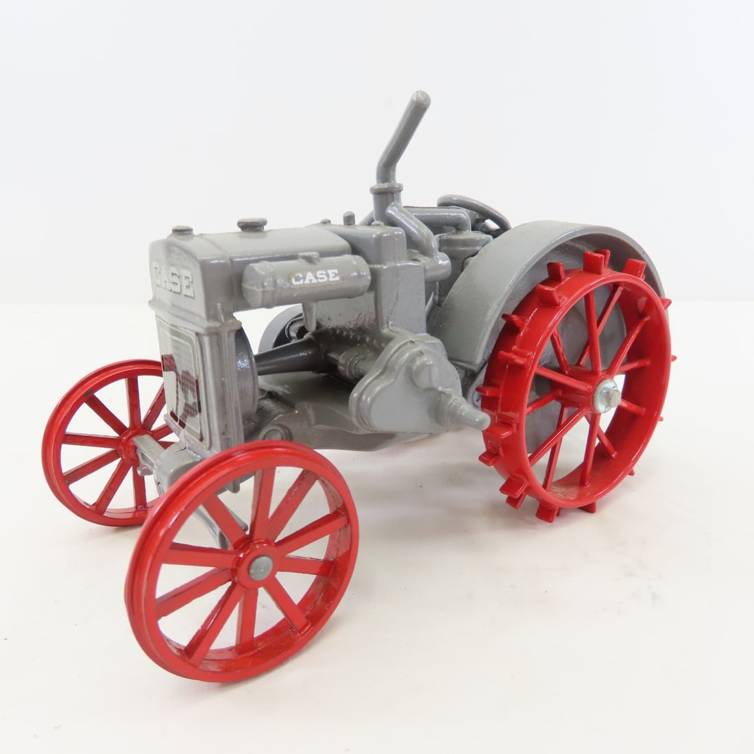 JLE Case Cross Motor Steel Wheel Tractor: JLE Case Cross Motor Steel Wheel Tractor - Stamped JLE Series #9, hang tag, 1/16 diecast, LOT SIZE: 9x5x5" 2 LBS All information and photos, which are part of the description) are intended to be as