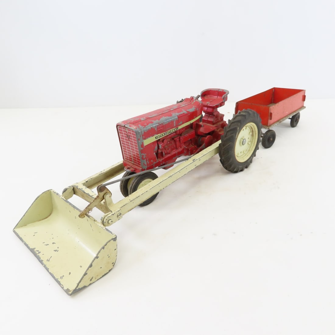 ERTL International Tractor w/loader, plow & cart - 2