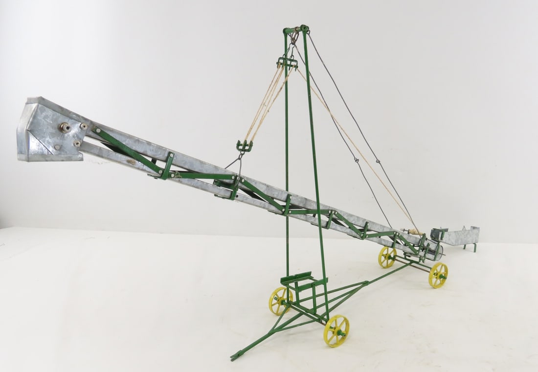 Scratch Built 1/16 scale Hay Elevator: Scratch Built 1/16 scale Hay Elevator - Not functional, just a display piece. Main elevator chute measures 26" long. LOT SIZE: 32x16x5" 2 LBS All information and photos, which are part of the descript