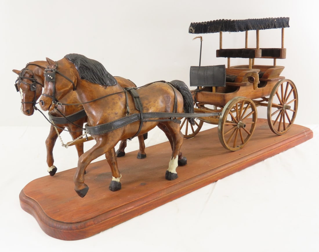 J DeFatte Custom Wood Horse Drawn 2 Seat Wagon: J DeFatte Custom Wood Horse Drawn 2 Seat Wagon - marked J DEFATTE 82, covered wagon- everything is wood except metal wheel bands, fabric roof and seats, leather harness. mounted to board, LOT SIZE: