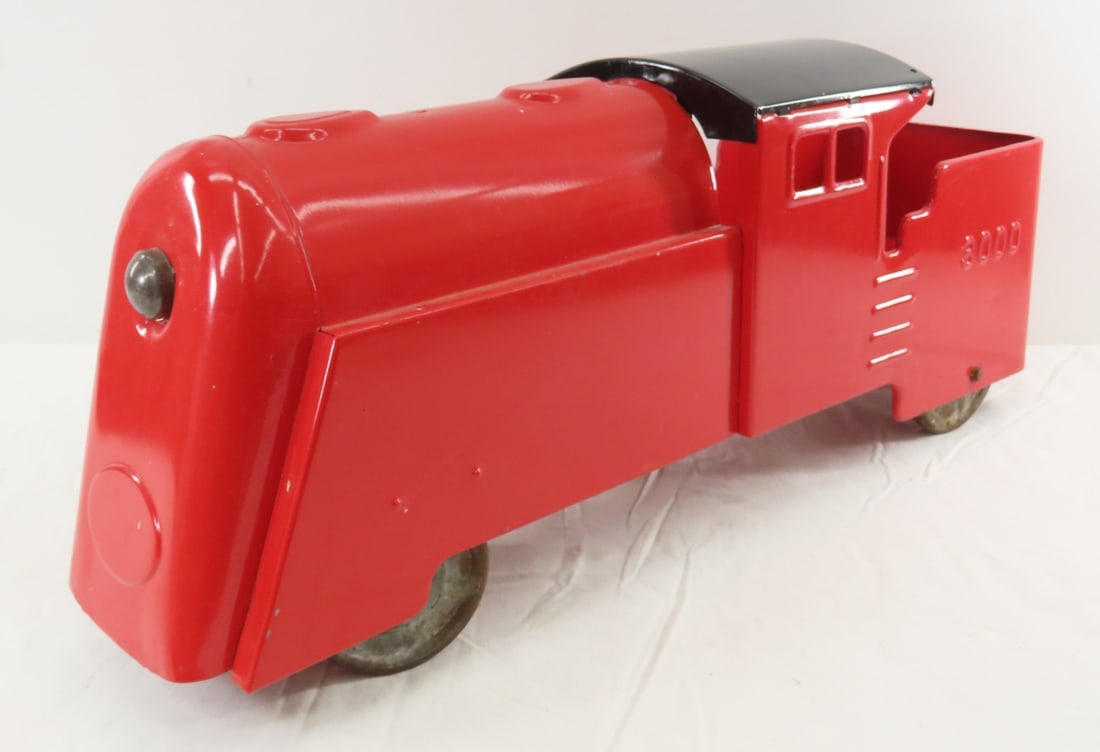 Custom Pressed Steel Train Engine 3000: Custom Pressed Steel Train Engine 3000 - modeled after MARX. LOT SIZE: 23x9x7" 8 LBS All information and photos, which are part of the description, are intended to be as accurate as possible, but erro