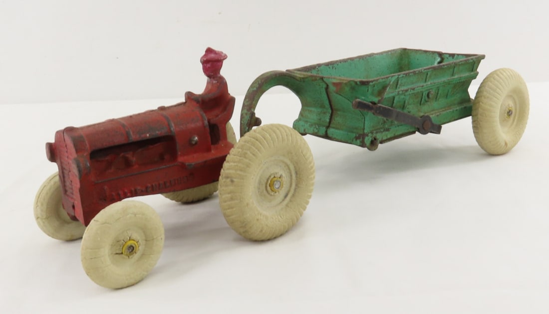Arcade Cast Iron Allis- Chalmers Tractor & Wagon: Arcade Cast Iron Allis- Chalmers Tractor & Wagon - bottom dump wagon has broken part (missing) and balloon tires, 265R tractor has repair drivers head and loose front axle- wheel falls off. LOT SIZE: 