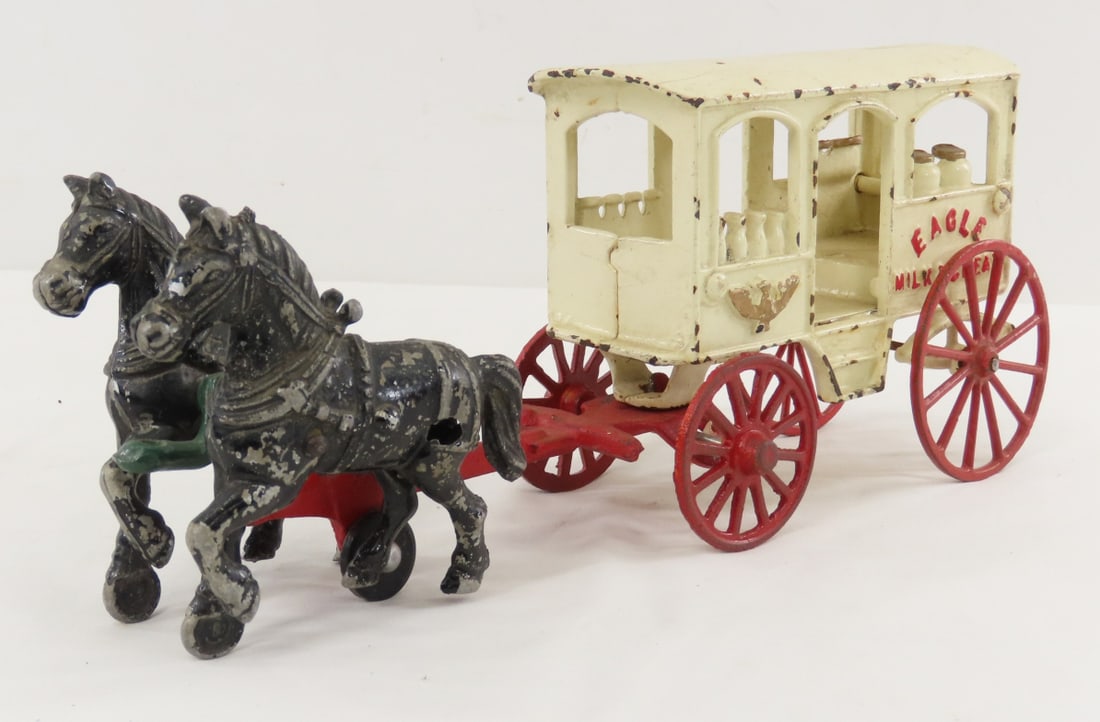 Kenton Eagle Milk & Cream Wagon: Kenton Eagle Milk & Cream Wagon - Stanley horse set is missing part of hitch- marked 408 made in USA, front wheels and axle with tongue from wagon are marked TAIWAN, looks to married with Kenton