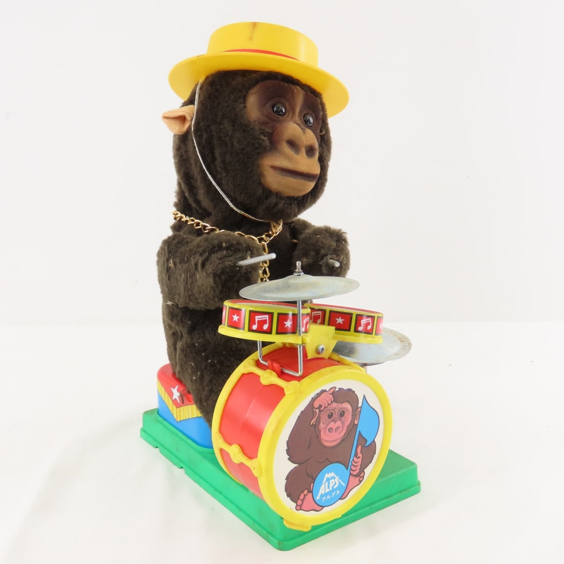Chimpee the One Man Drummer Toy by Alps Japan: Chimpee the One Man Drummer Toy by Alps Japan - tin litho plush money, plastic base, battery operated, not working. LOT SIZE: 8x11x6" 2 LBS All information and photos, which are part of the descriptio