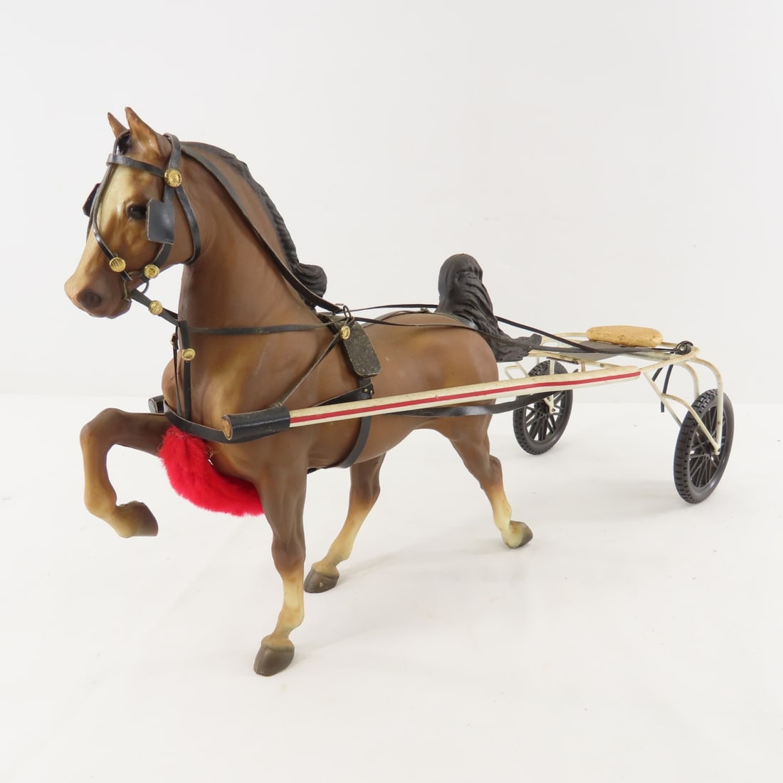 Custom Racing Sulky with Plastic Breyer Horse: Custom Racing Sulky with Plastic Breyer Horse - metal frame with plastic wheels, LOT SIZE: 16x10x7" 1 LB All information and photos, which are part of the description, are intended to be as accurate