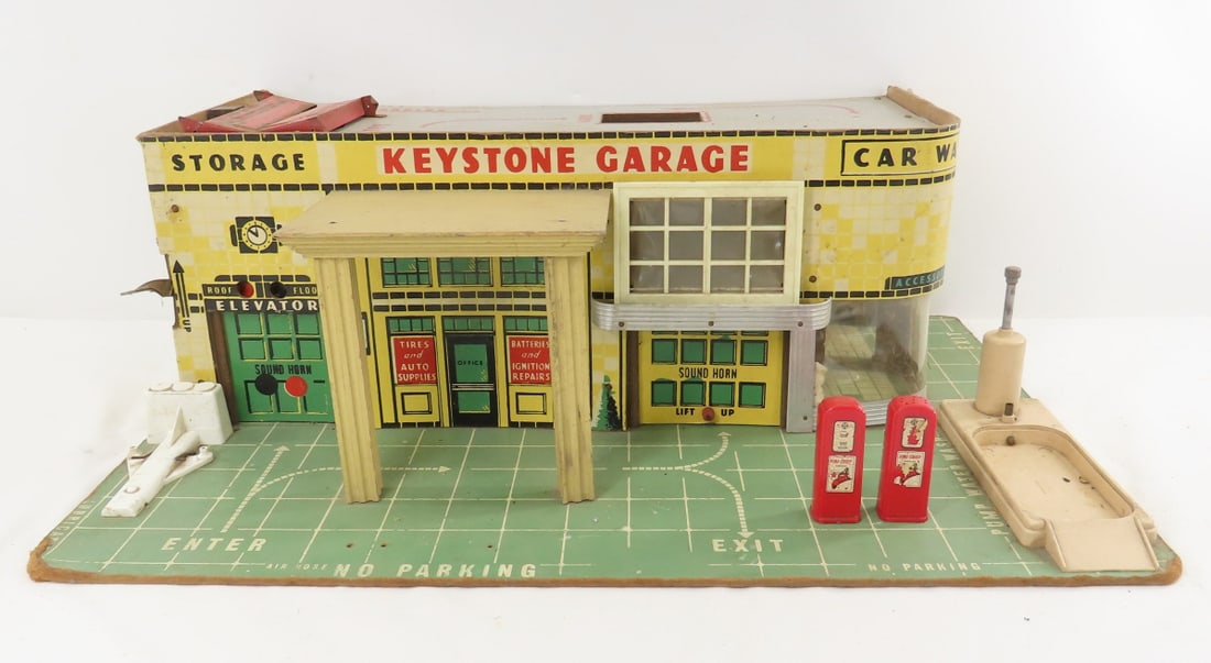 1950's Keystone Garage Litho Cardboard: 1950's Keystone Garage Litho Cardboard - has had wooden awning added, pair of Texaco fire chief salt & pepper gas pumps. LOT SIZE: 24x16x9" 6 LBS All information and photos, which are part of the