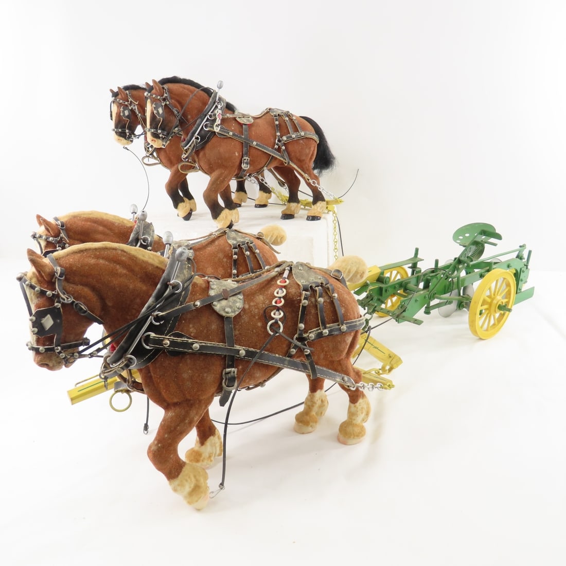 Custom John Deere Horse Drawn Riding 2 Bottom Plow: Custom John Deere Horse Drawn Riding 2 Bottom Plow - 4 felted plastic horses- 2 sets of 2 horses with leather harnesses. LOT SIZE: 26x14x9" 6 LBS All information and photos, which are part of the
