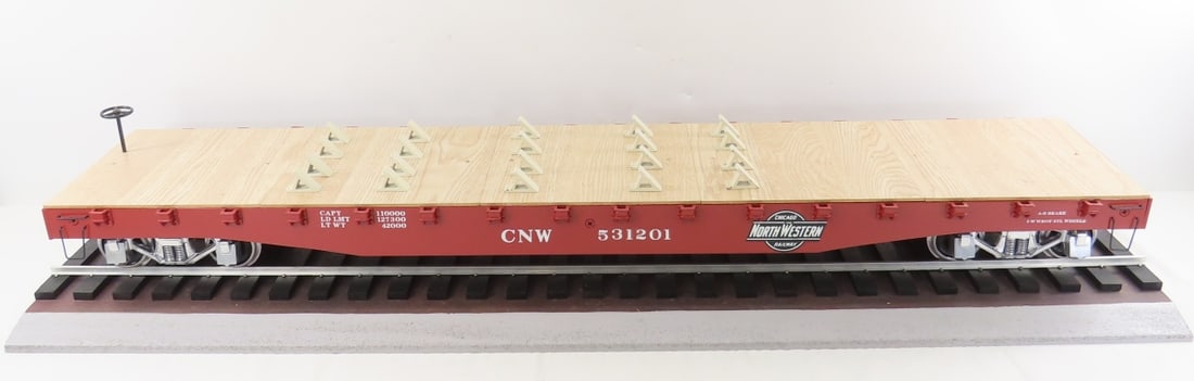 Peter Freiheit Custom C&NW Flat Car on Track: Peter Freiheit Custom C&NW Flat Car on Track - steel frame flat car with wood deck mounted to wood board with metal track. LOT SIZE: 43x12x7" 30 LBS All information and photos, which are part of the d