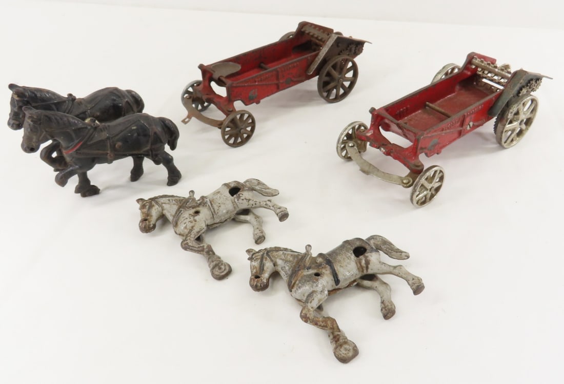 2 Arcade Cast Iron Horse Drawn MD Manure Spreaders: 2 Arcade Cast Iron Horse Drawn MD Manure Spreaders - McCormick-Deering spreader, hitching hardware is incomplete. LOT SIZE: 13x9x5" 6 LBS All information and photos, which are part of the