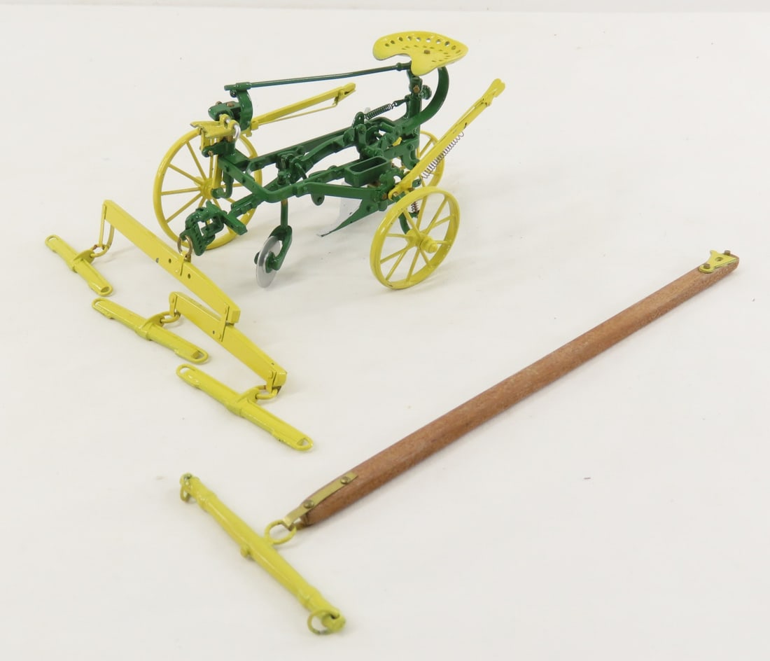 Custom John Deere 2 Horse Drawn Seated Plow: Custom John Deere 2 Horse Drawn Seated Plow - possible Gilson Riecke, has some damage as shown in photos. approx 1/16 scale LOT SIZE: 9x6x3" 1 LB All information and photos, which are part of the