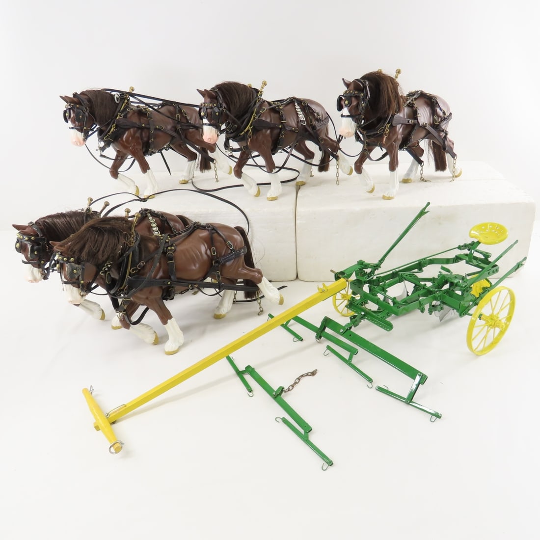 Custom Horse Drawn Seated 2 Bottom Plow: Custom Horse Drawn Seated 2 Bottom Plow - unmarked plow- possible Gilson Riecke, with 5 ERTL plastic horses and leather harnesses, approx 1/8 scale. LOT SIZE: 21x14x7" 7 LBS All information and