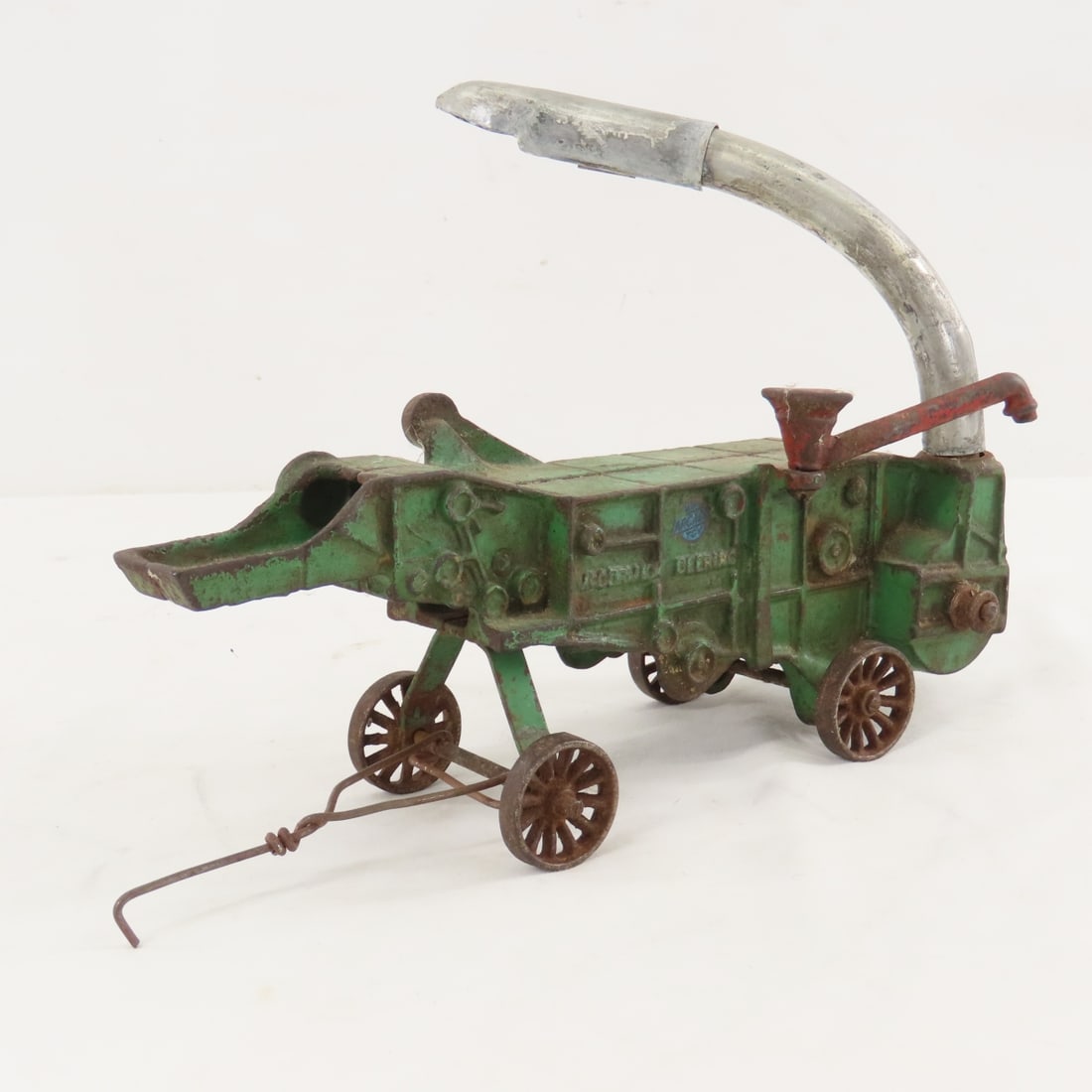 Arcade Cast Iron McCormick-Deering 450 Thresher: Arcade Cast Iron McCormick-Deering 450 Thresher - customized piece added to chute, LOT SIZE: 10x3x7" 2 LBS All information and photos, which are part of the description, are intended to be as accurate