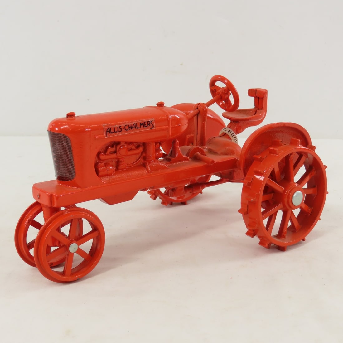 JLE Allis-Chalmers NF WC Tractor: JLE Allis-Chalmers NF WC Tractor - steel wheels, 1/16 diecast, LOT SIZE: 8x5x5" 2 LBS All information and photos, which are part of the description, are intended to be as accurate as possible, but err