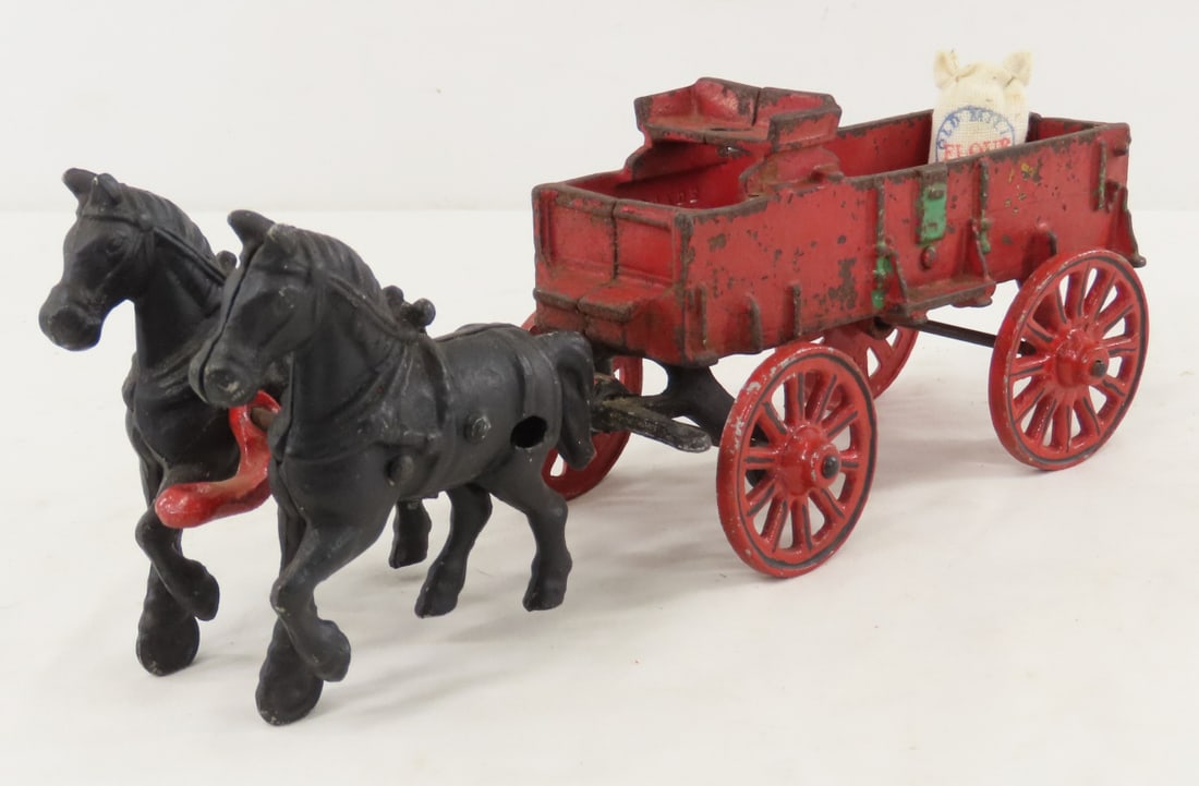 Vintage Stanley Cast Metal 2 Horse Drawn Wagon: Vintage Stanley Cast Metal 2 Horse Drawn Wagon - marked made in USA and 408 on tongue, heavy wear on paint- some touch ups . LOT SIZE: 12x5x4" 2 LBS All information and photos, which are part of the